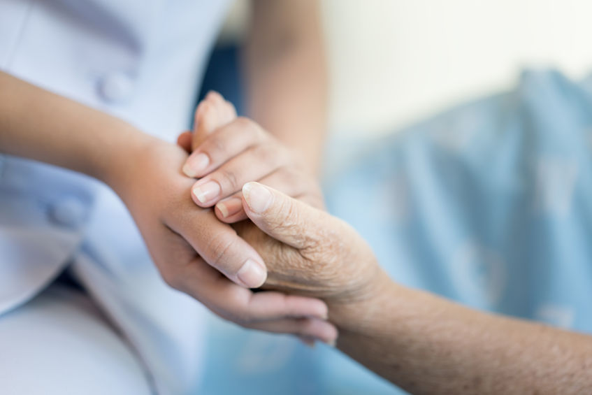 Woman Holding Mothers Hand