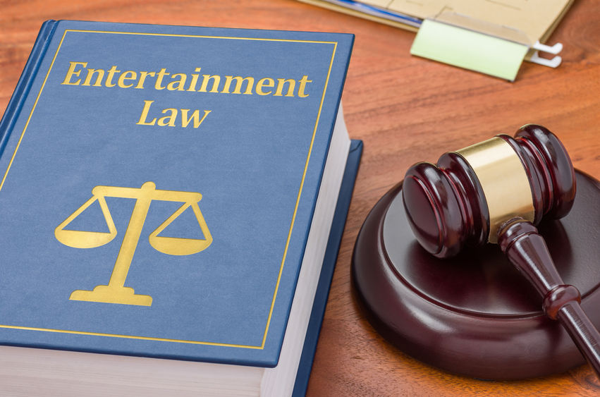 A law book with a gavel - Entertainment law