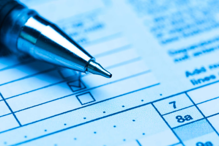 US tax form with pen referencing IRS Payment Plan