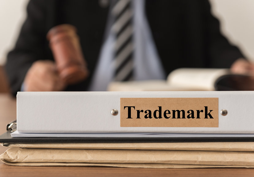 closeup trademark document folder with lawyer work at law firm. concept of trademark law.