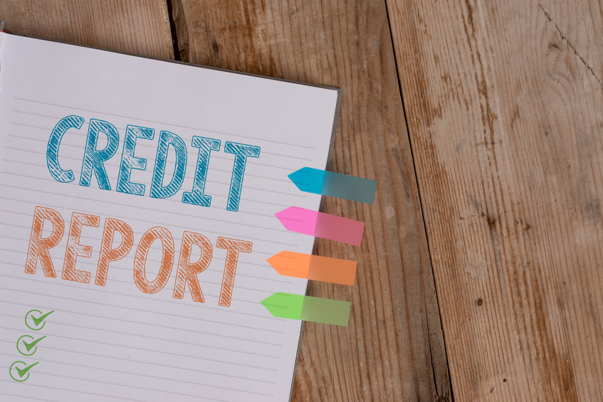 Handwriting text writing Credit Report. Concept meaning Borrowing Rap Sheet Bill and Dues Payment Score Debt History Striped note book four colored arrow banners reminder wooden background in reference to credit report