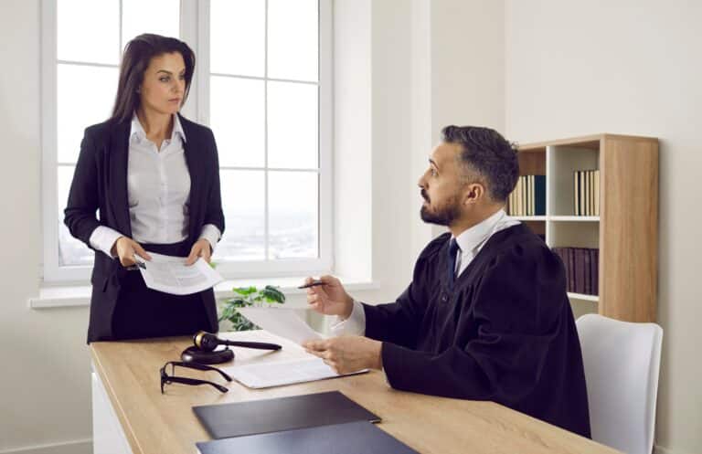 Lawyer talking to the judge in the courthouse