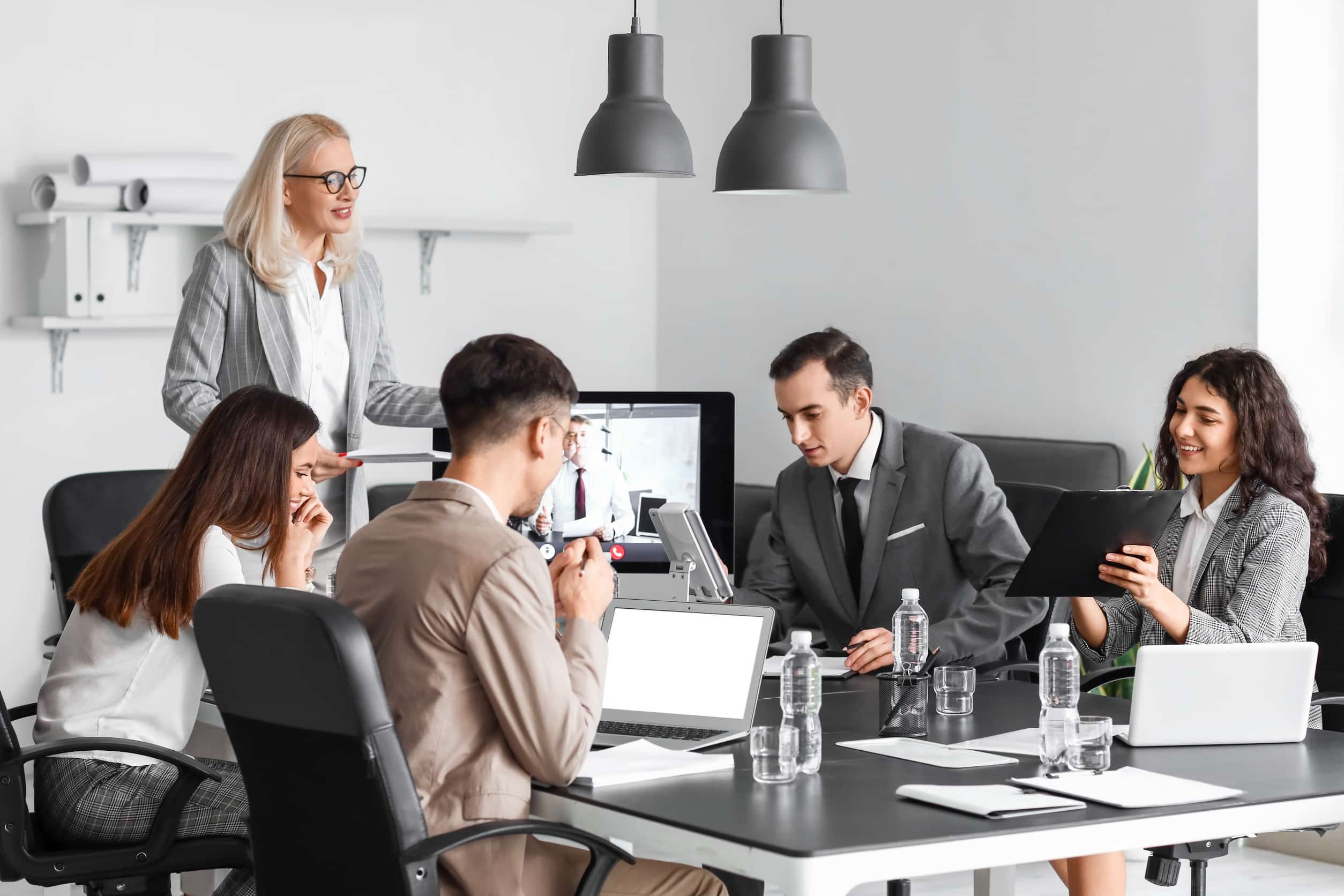 business people having online meeting in office