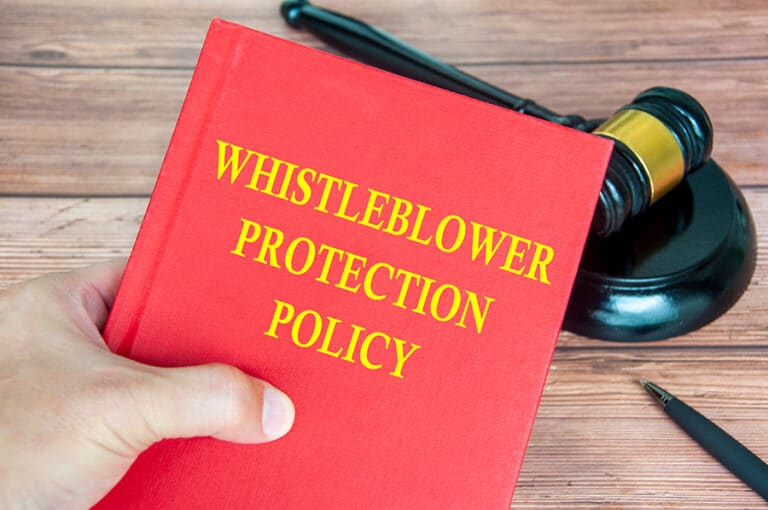 A photo of a Whistleblower Protections Policy Book