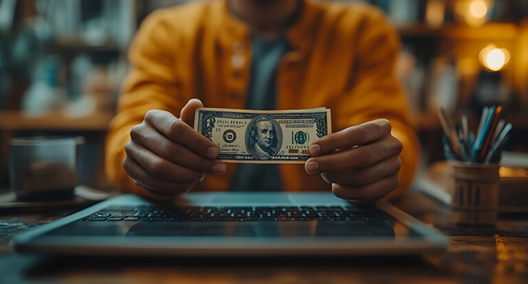 A content creator holding a dollar bill
