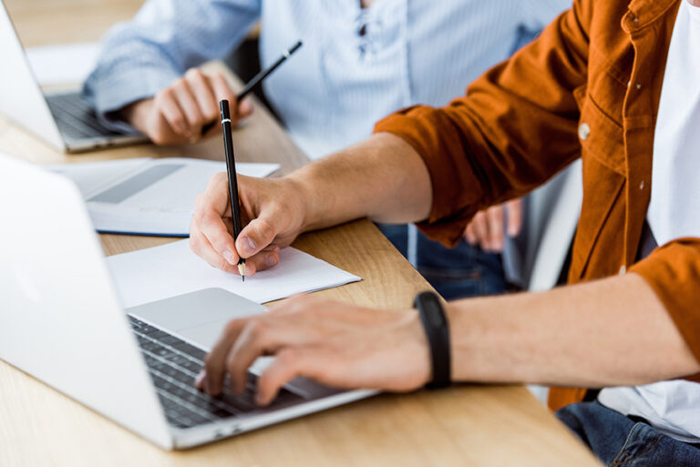 non-lawyer is giving advice to other people on a sheet of paper and a PC.