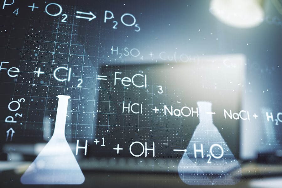 Two beakers with chemical product formula